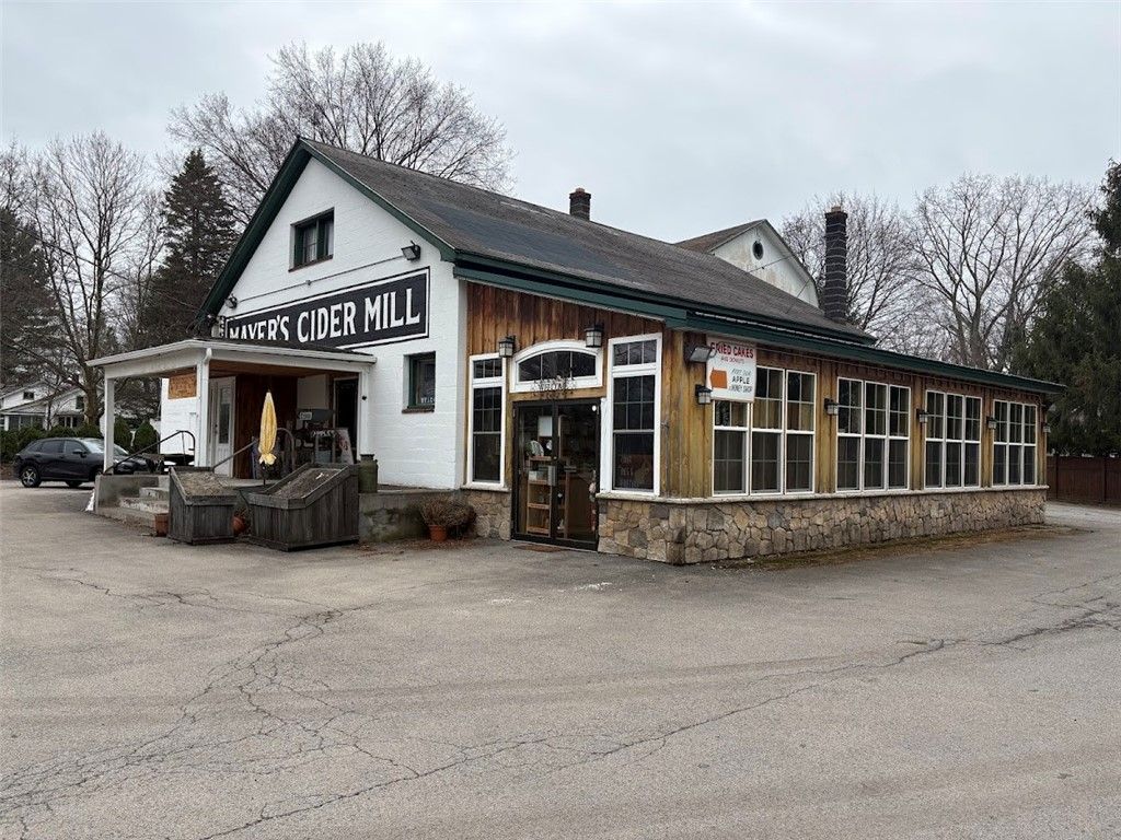 Photo of 699 Five Mile Line Road Road, Webster, NY 14580 (MLS # R1675406)