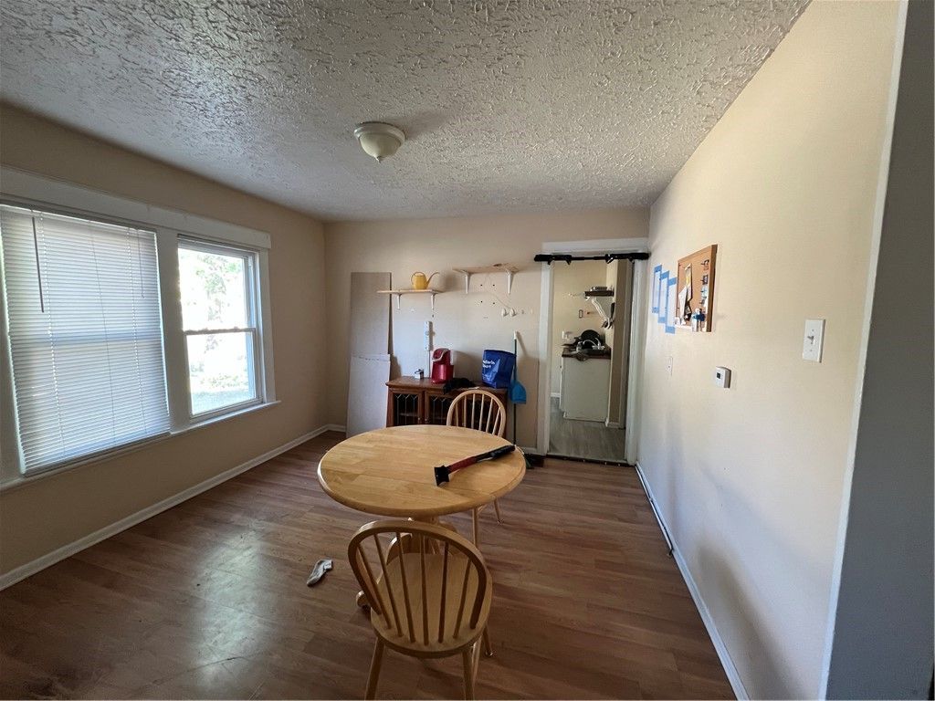 Photo of 53 Scottsville Road, Rochester, NY 14611 (MLS # R1641498)