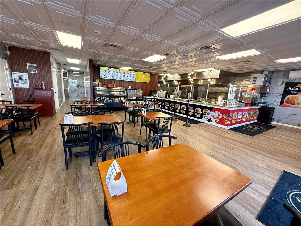 Photo of 1555 E Henrietta Rd Rd, Henrietta, NY 14623 (MLS # R1671632)