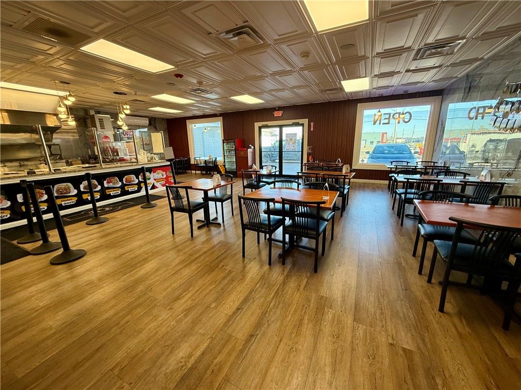 Photo of 1555 E Henrietta Rd Rd, Henrietta, NY 14623 (MLS # R1671632)