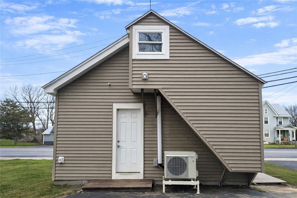 Photo of 3170 E Henrietta Road, Henrietta, NY 14467 (MLS # R1665819)