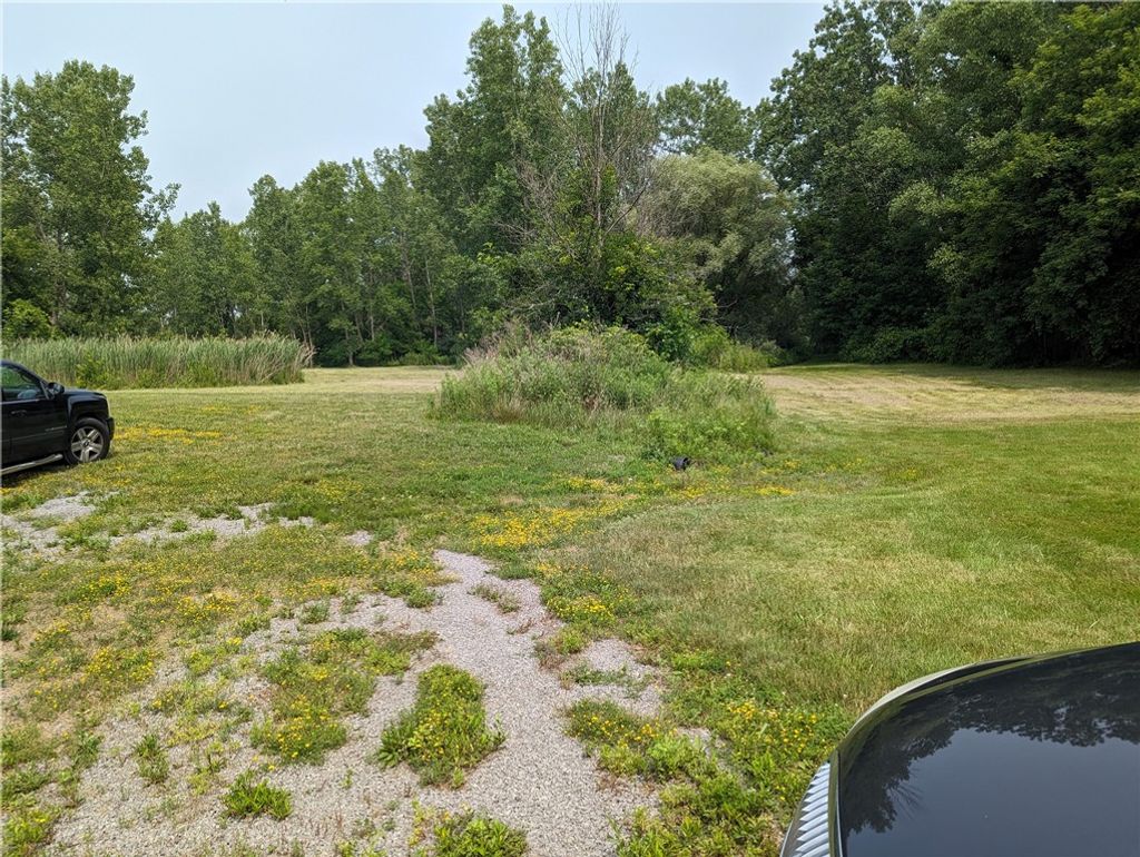 Photo of 1576 Ridge Road, Webster, NY 14580 (MLS # R1657427)