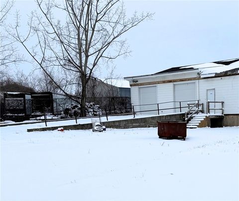 Photo of 124 Portland Avenue, Rochester, NY 14605 (MLS # R1659502)