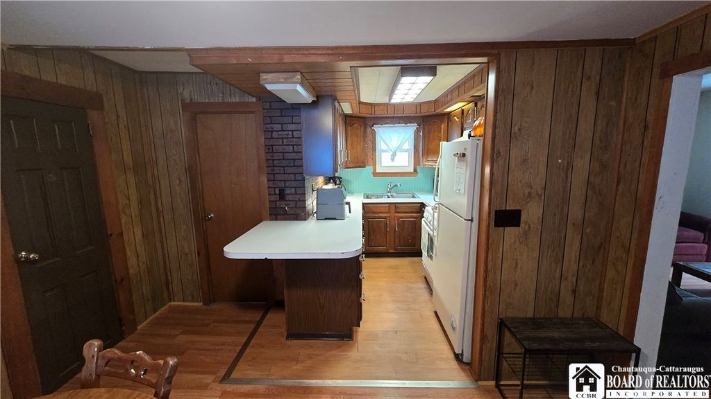 Photo of 63 Eagle Street, Pomfret, NY 14063 (MLS # R1667973)