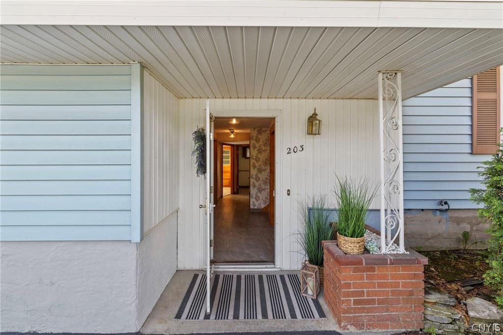 Photo of 203 Oakridge Drive, Camillus, NY 13031 (MLS # S1704495)