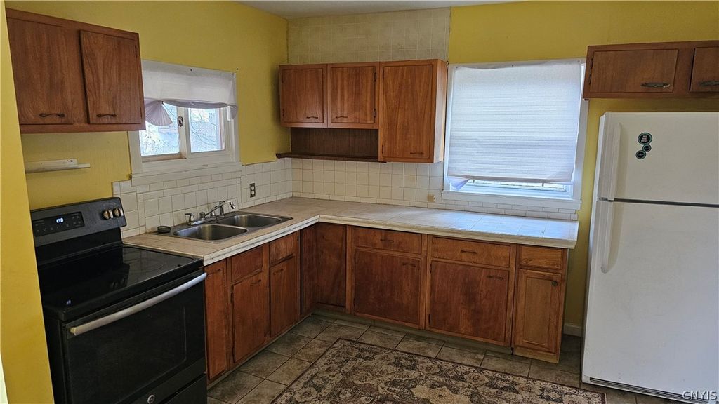 Photo of 203 Wilmont Road, Camillus, NY 13219 (MLS # S1666697)