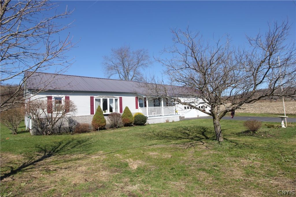 Photo of 817 County Road 20, Smyrna, NY 13464 (MLS # S1672936)