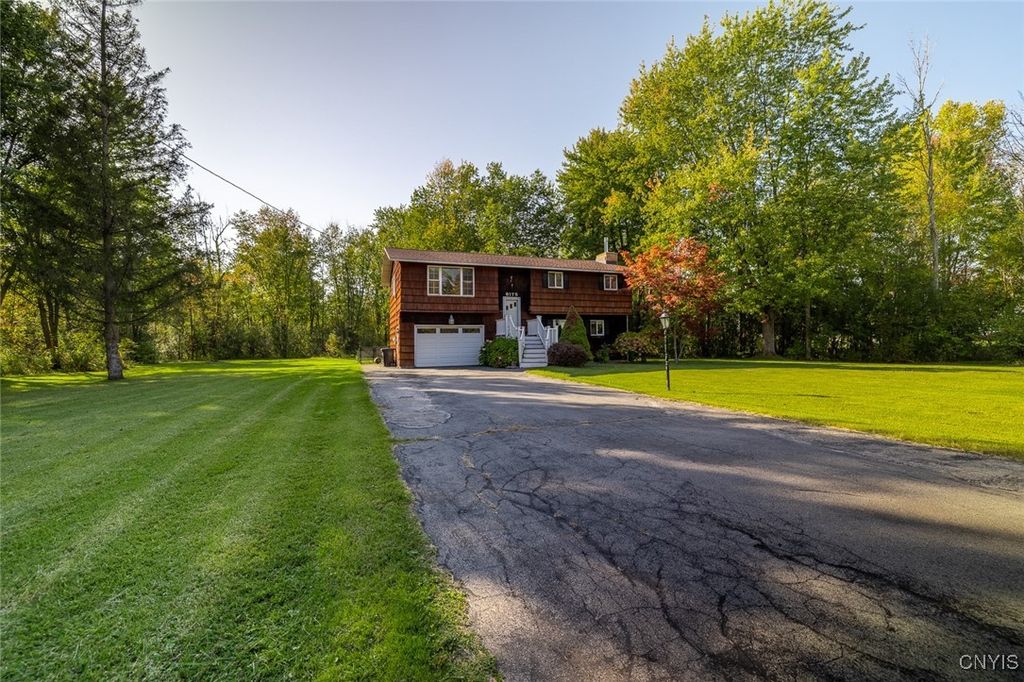 Photo of 8175 Caughdenoy Road, Clay, NY 13041 (MLS # S1652400)