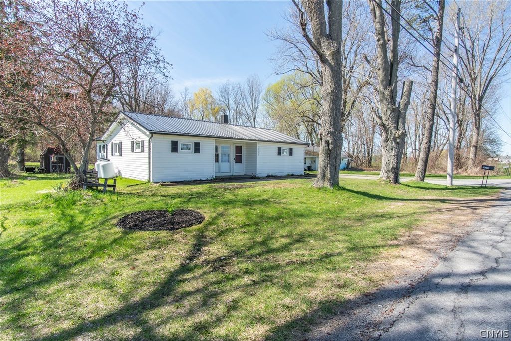 Photo of 20295 Storrs Road, Hounsfield, NY 13685 (MLS # S1675125)