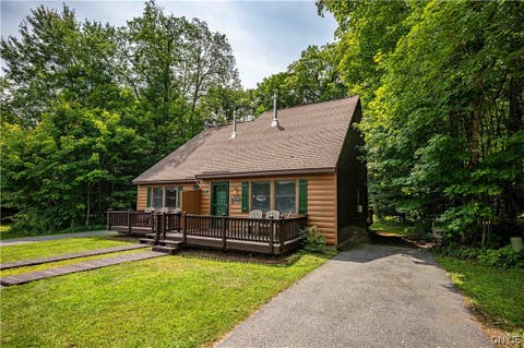Photo of 112 Holiday Drive, Webb, NY 13420 (MLS # S1705503)