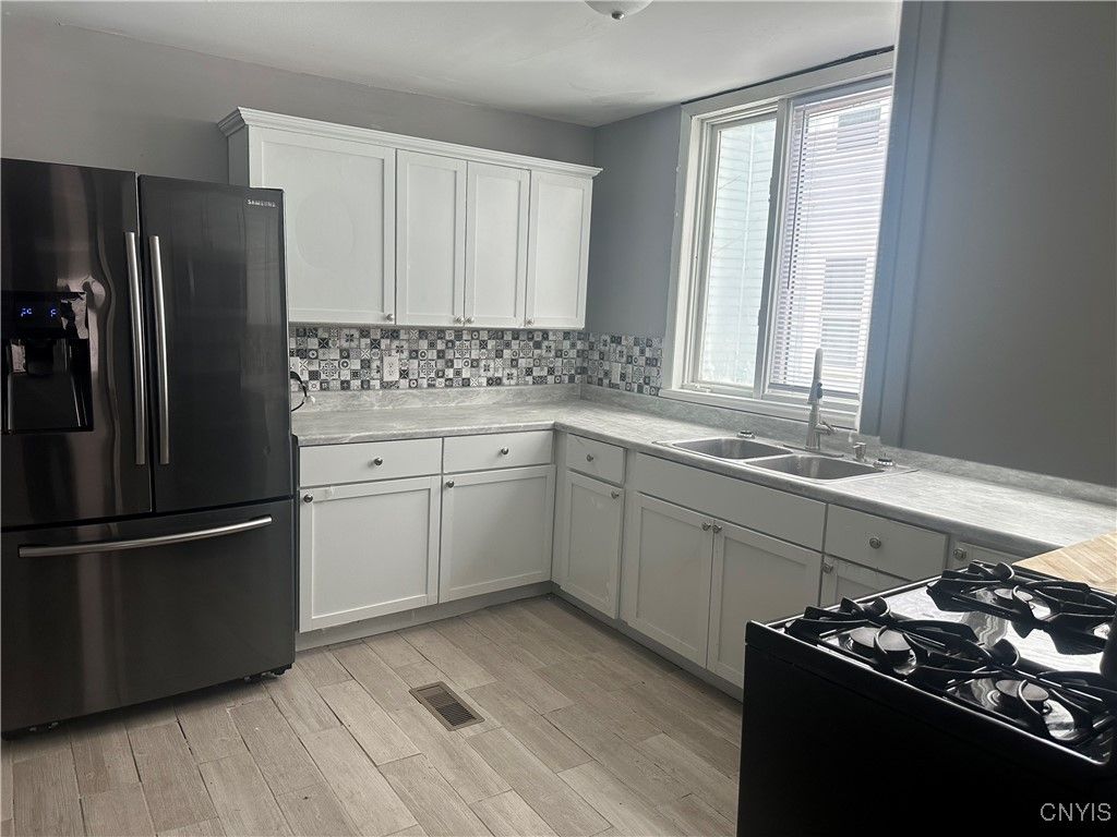 Photo of 521 Floyd Ave, Rome, NY 13440 (MLS # S1652787)