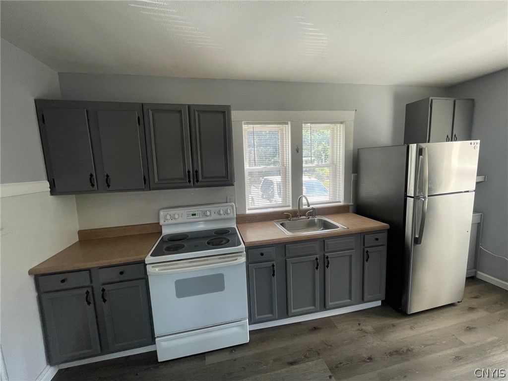 Photo of 44 Bridge Street, Schroeppel, NY 13135 (MLS # S1676976)