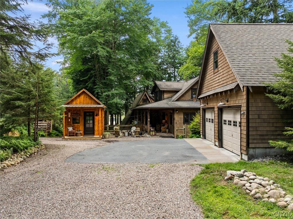 Photo of 582 S Shore Road, Webb, NY 13420 (MLS # S1703523)