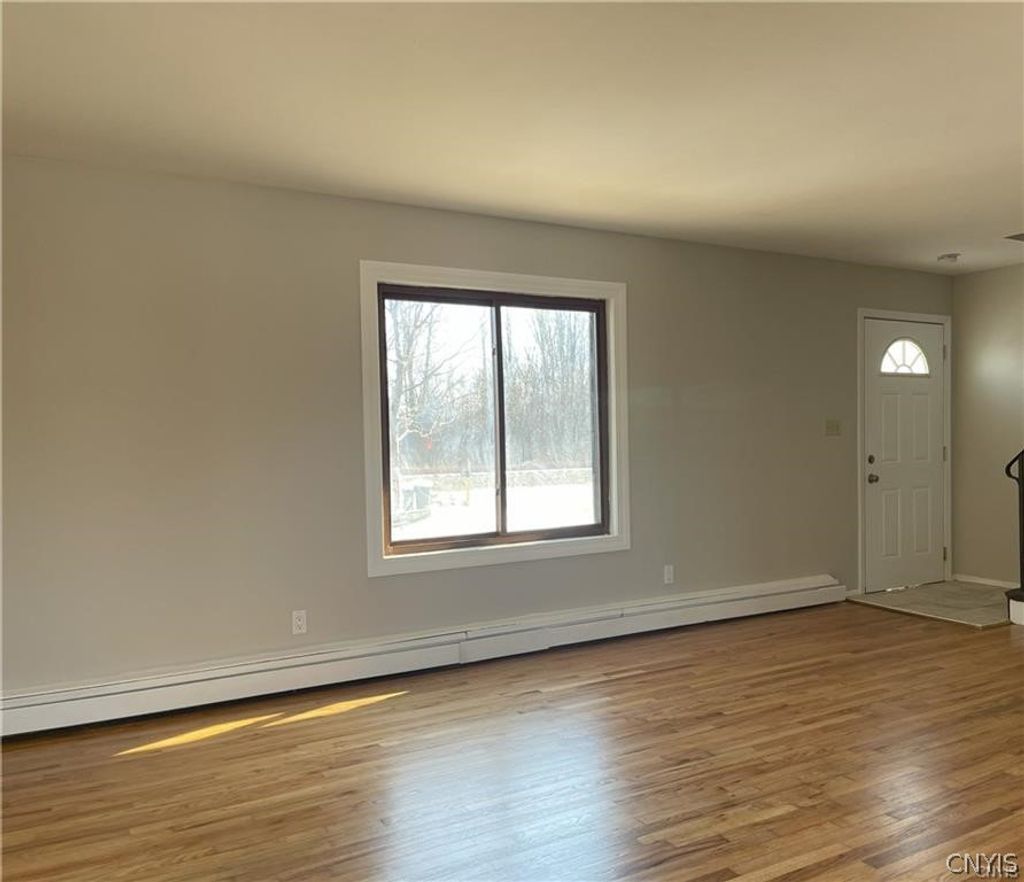 Photo of 6435 Wells Drive #Left, DeWitt, NY 13057 (MLS # S1677302)