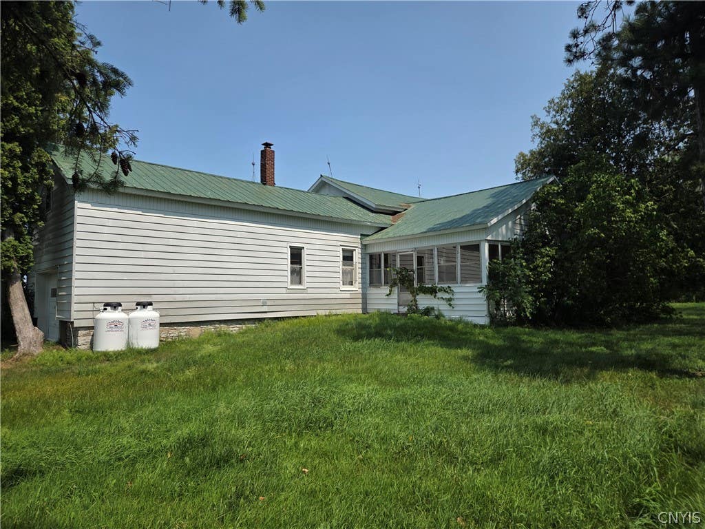 Photo of 7709 Ridge Road, Lowville, NY 13367 (MLS # S1710158)