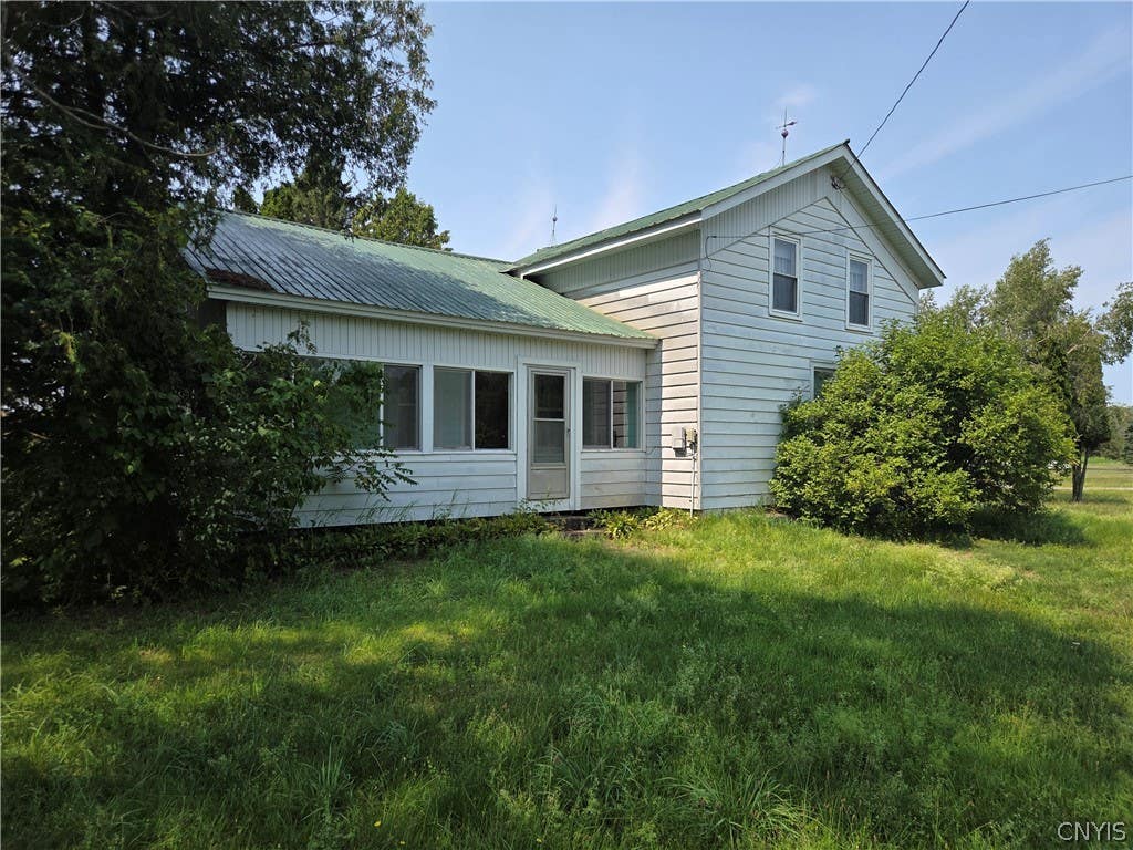 Photo of 7709 Ridge Road, Lowville, NY 13367 (MLS # S1710158)