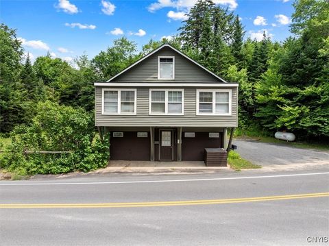 Photo of 1562 Big Moose Road, Eagle Bay, NY 13331 (MLS # S1622028)