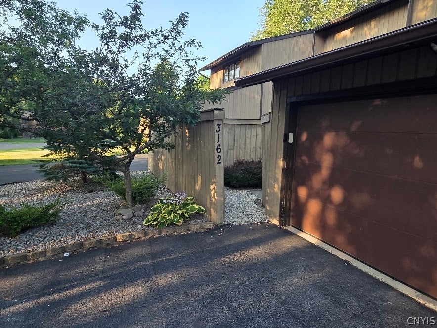 Photo of 3162 Burrwood Drive, Lysander, NY 13027 (MLS # S1702115)