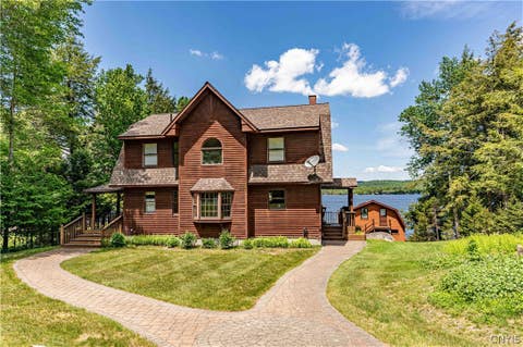 Photo of 128 Cedar Point Drive, Webb, NY 13420 (MLS # S1676499)