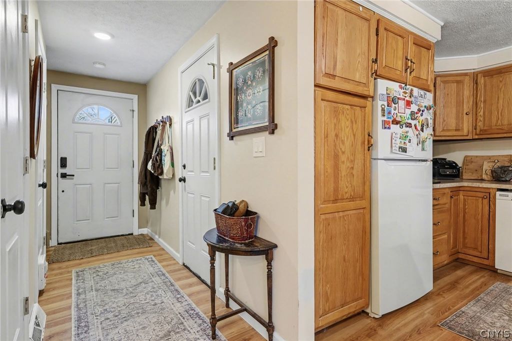 Photo of 8015 Marlin Drive #B, Clay, NY 13041 (MLS # S1664422)