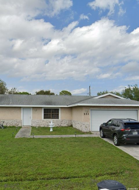 Single Family Residence in Florida FL 553 Sw Violet Avenue.jpg