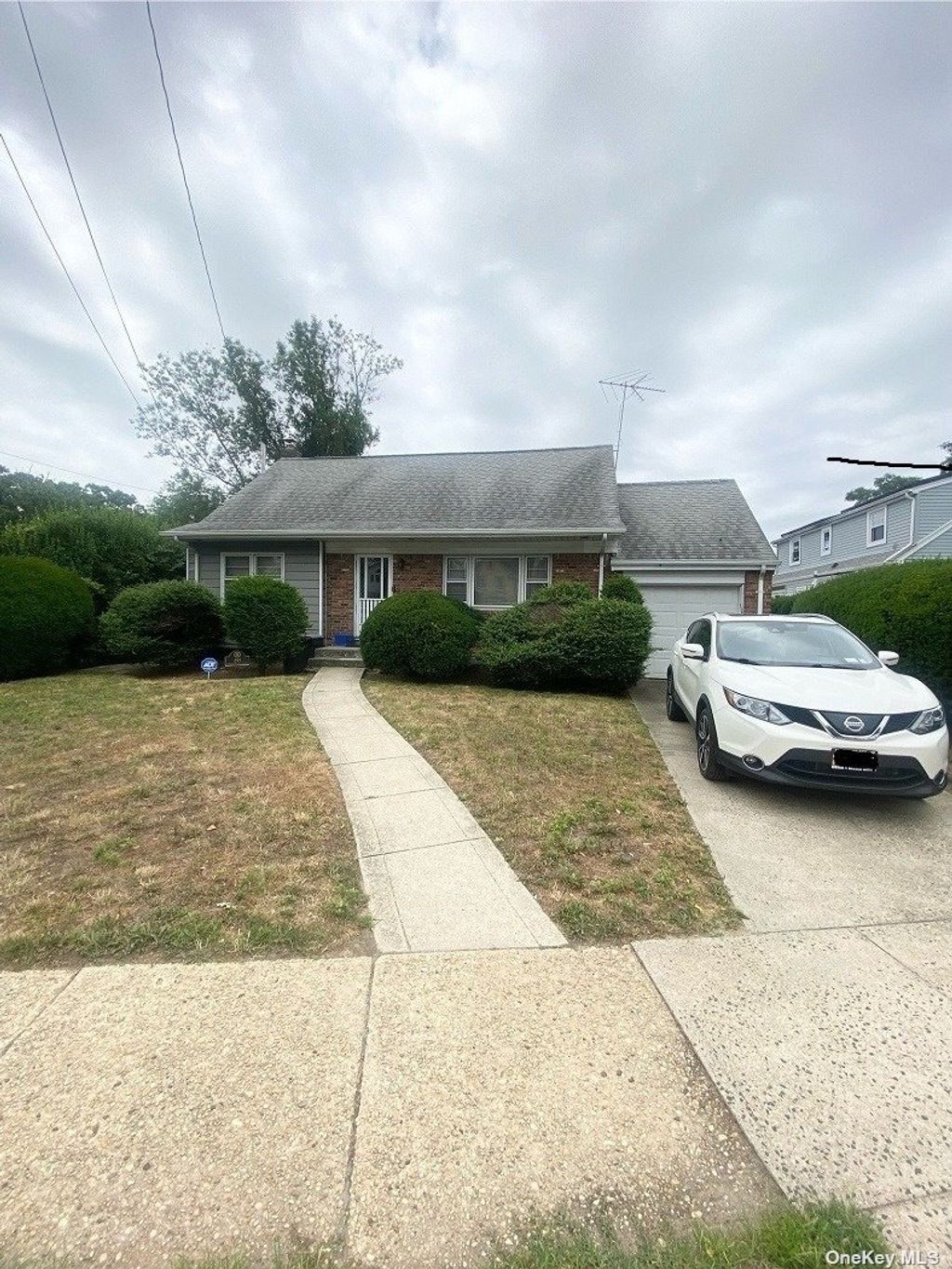 255 W Centennial Avenue, Roosevelt, NY 11575, MLS 3562584 Howard Hanna