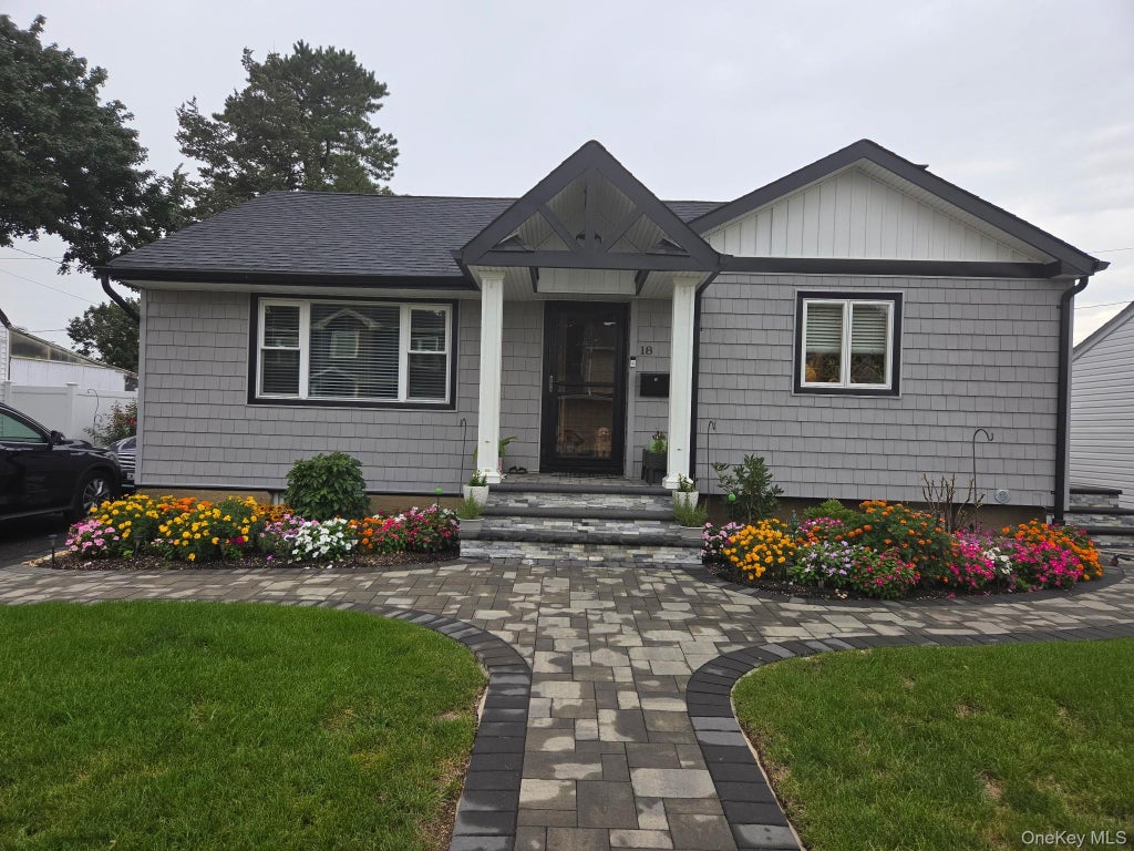Photo of 18 Devon Road, Bethpage, NY 11714 (MLS # 1048948)