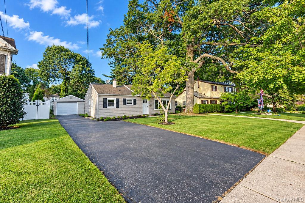 Photo of 7 Surrey Road, Massapequa, NY 11758 (MLS # 1059525)