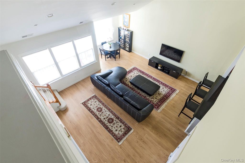 Photo of 8 Wexford Lane #1, Oceanside, NY 11572 (MLS # 995840)