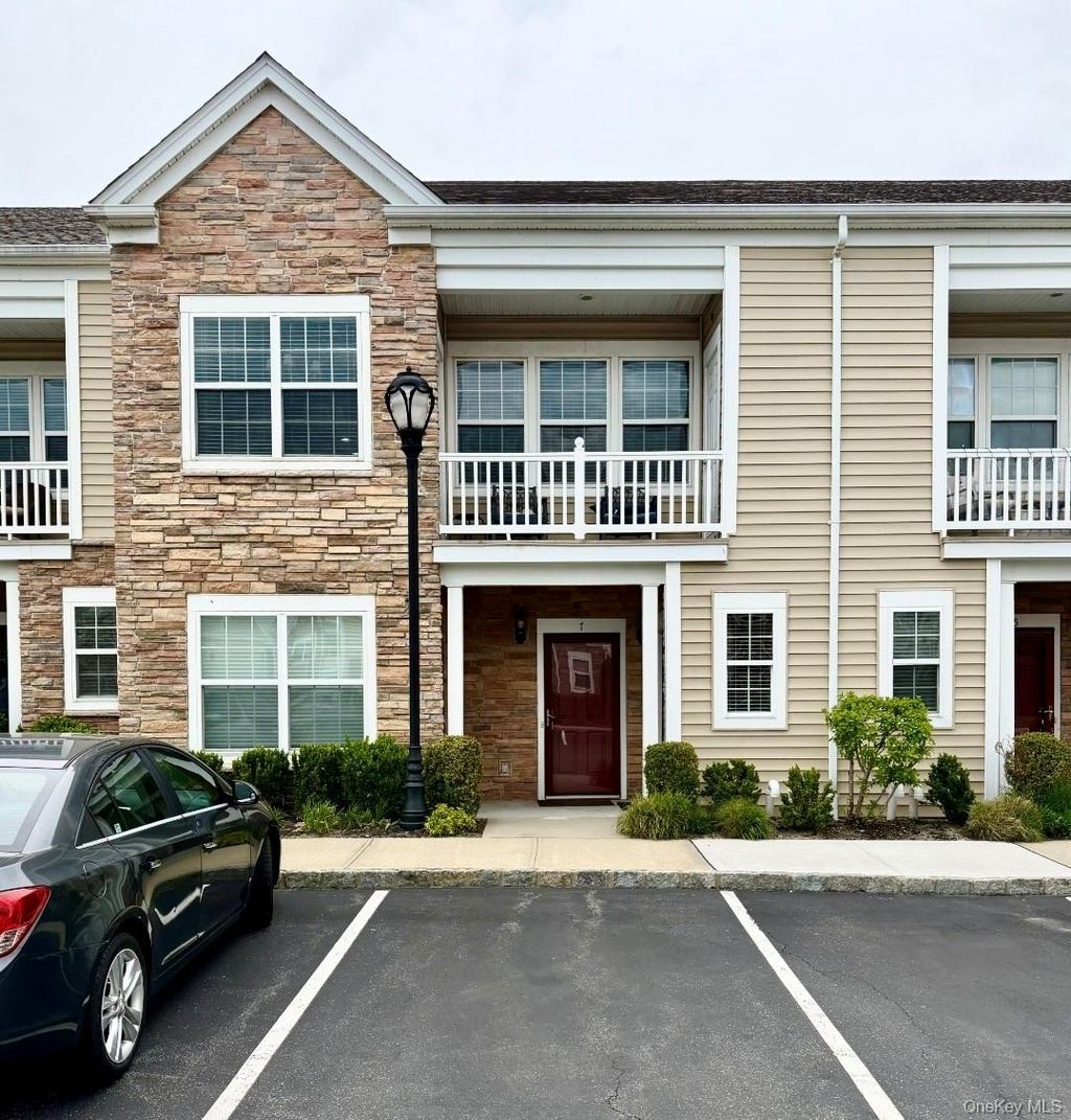 Photo of 8 Wexford Lane #1, Oceanside, NY 11572 (MLS # 995840)
