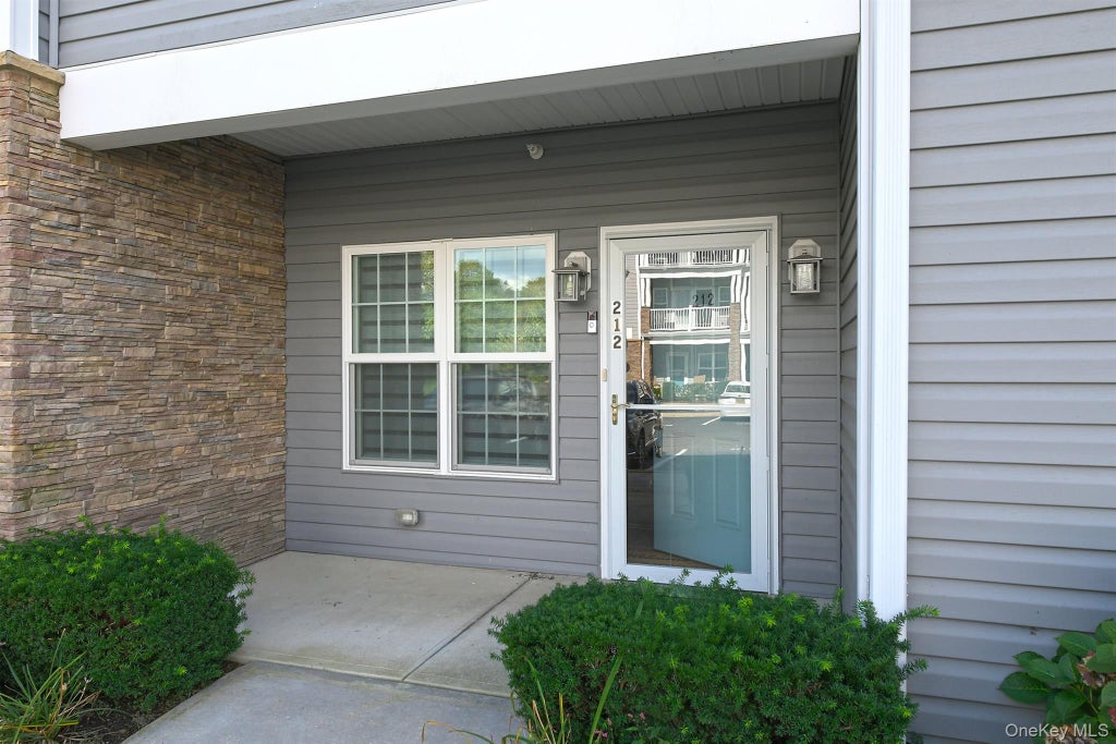 Photo of 212 Clubhouse Circle #212, Melville, NY 11747 (MLS # 1056360)