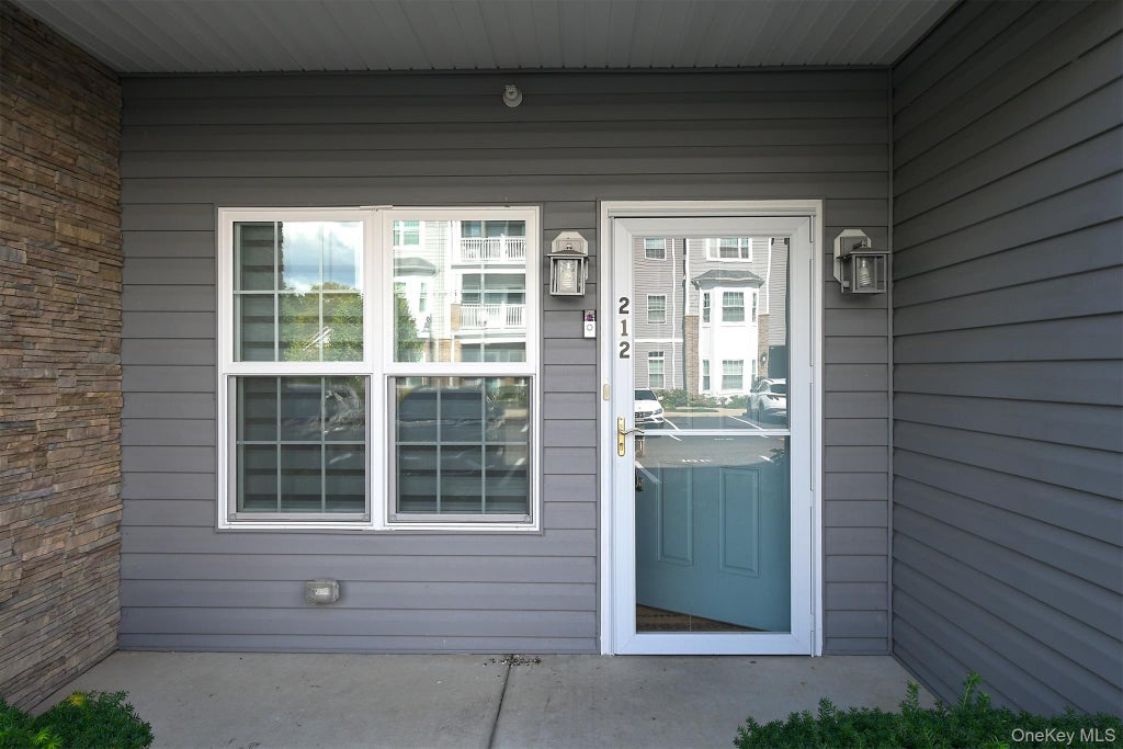 Photo of 212 Clubhouse Circle #212, Melville, NY 11747 (MLS # 1056360)