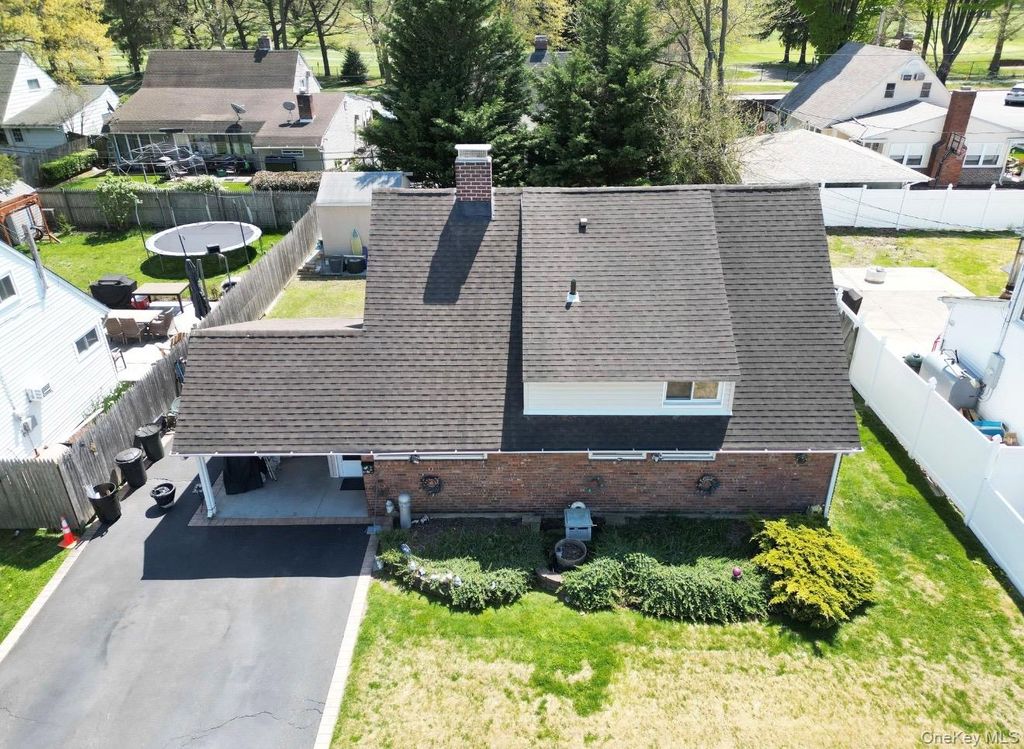 Photo of 6 Mead Lane, Westbury, NY 11590 (MLS # 990754)