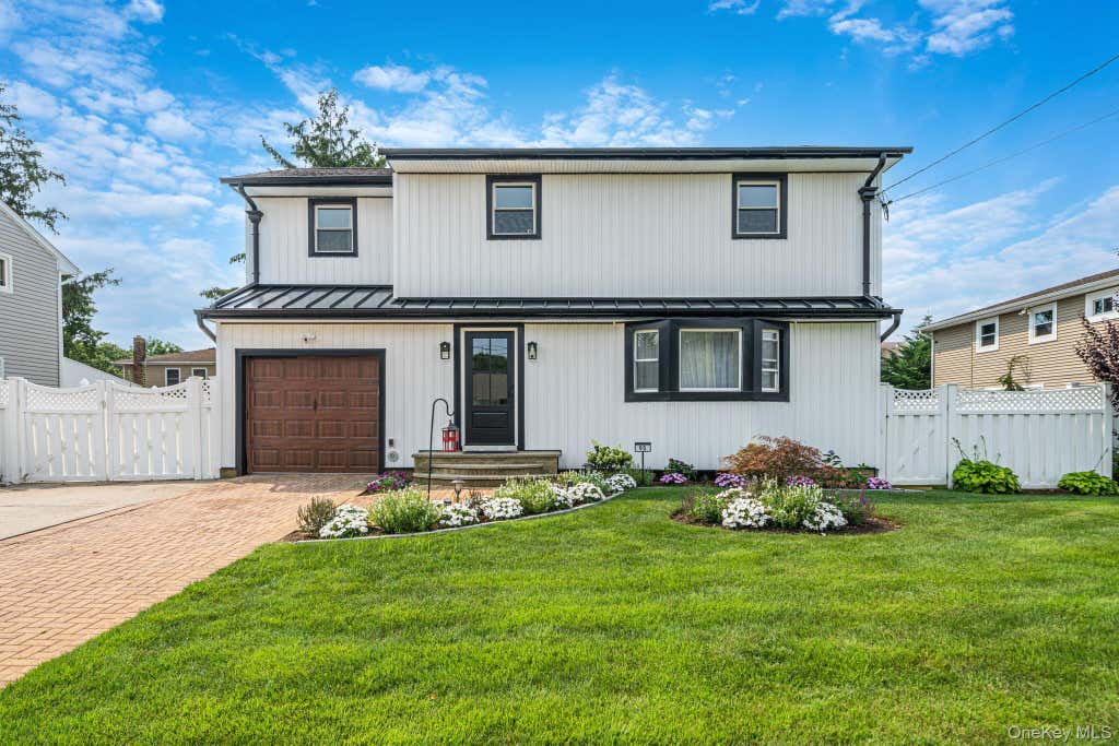 Photo of 95 Colonial Drive, Massapequa, NY 11758 (MLS # 1039621)
