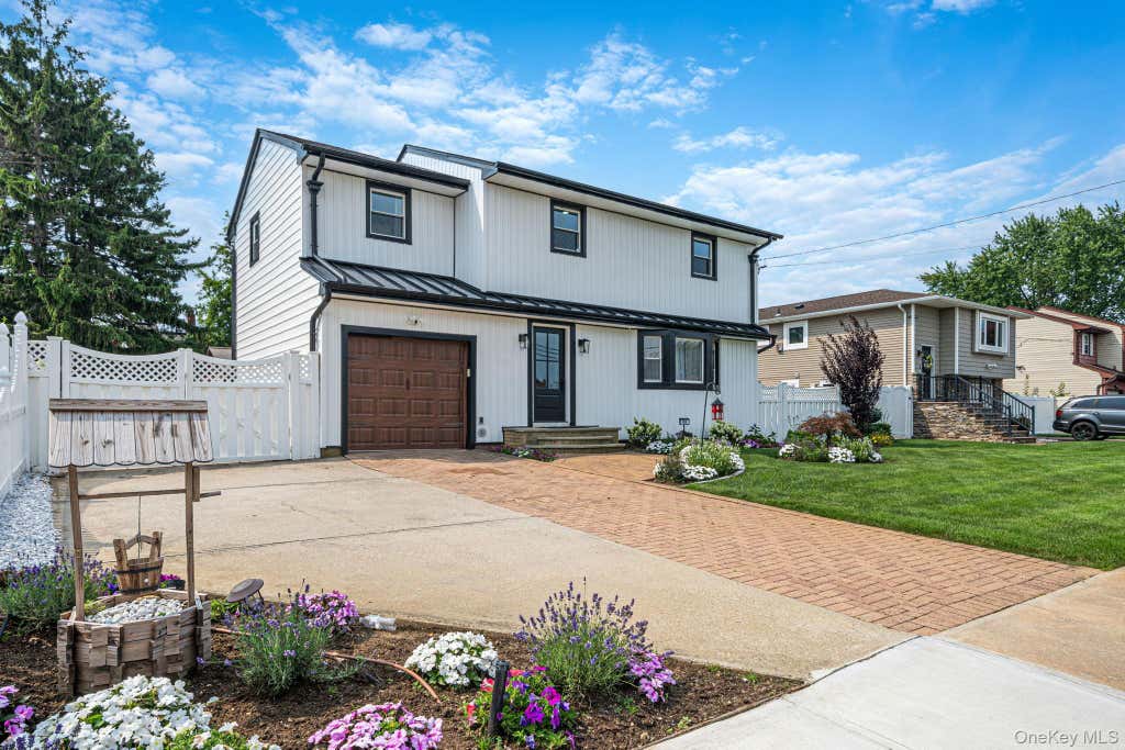 Photo of 95 Colonial Drive, Massapequa, NY 11758 (MLS # 1039621)