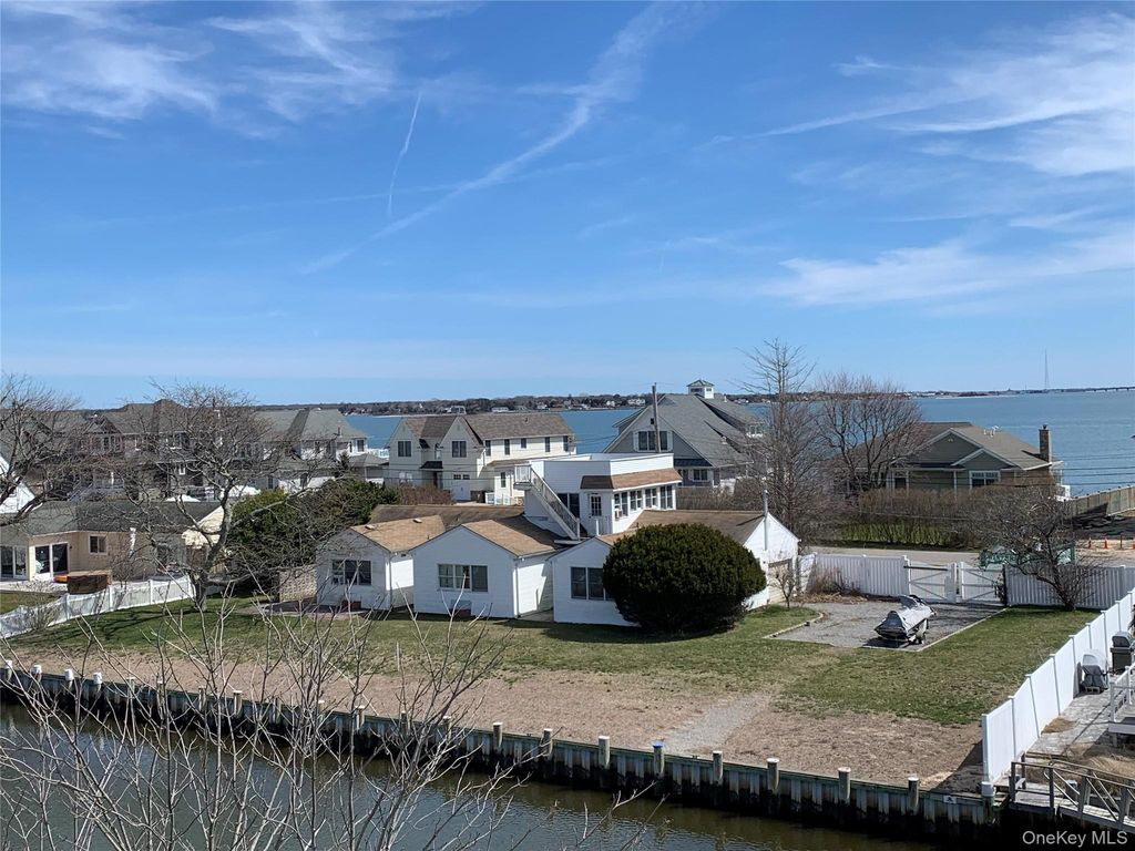 Photo of 12 Shinnecock Road, East Quogue, NY 11942 (MLS # 961017)