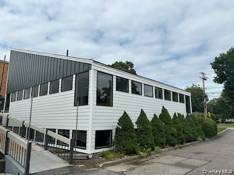 Photo of 152 E Main Street #CW and CE, Huntington, NY 11743 (MLS # 965199)