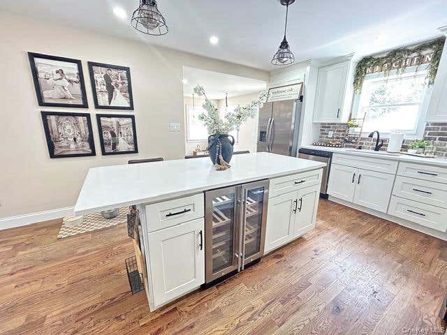 Photo of 32 Morris Avenue, Patchogue, NY 11772 (MLS # 1028853)
