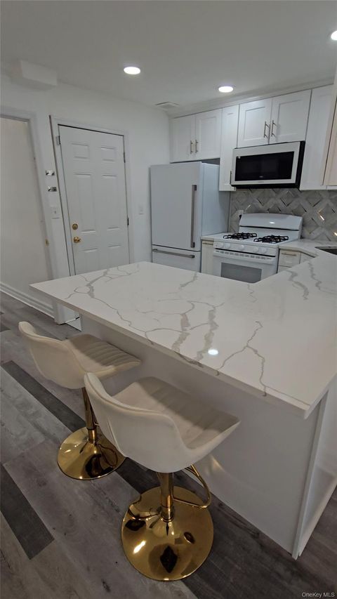 Photo of 101-25 111th St #1, Richmond Hill S., NY 11419 (MLS # 961105)