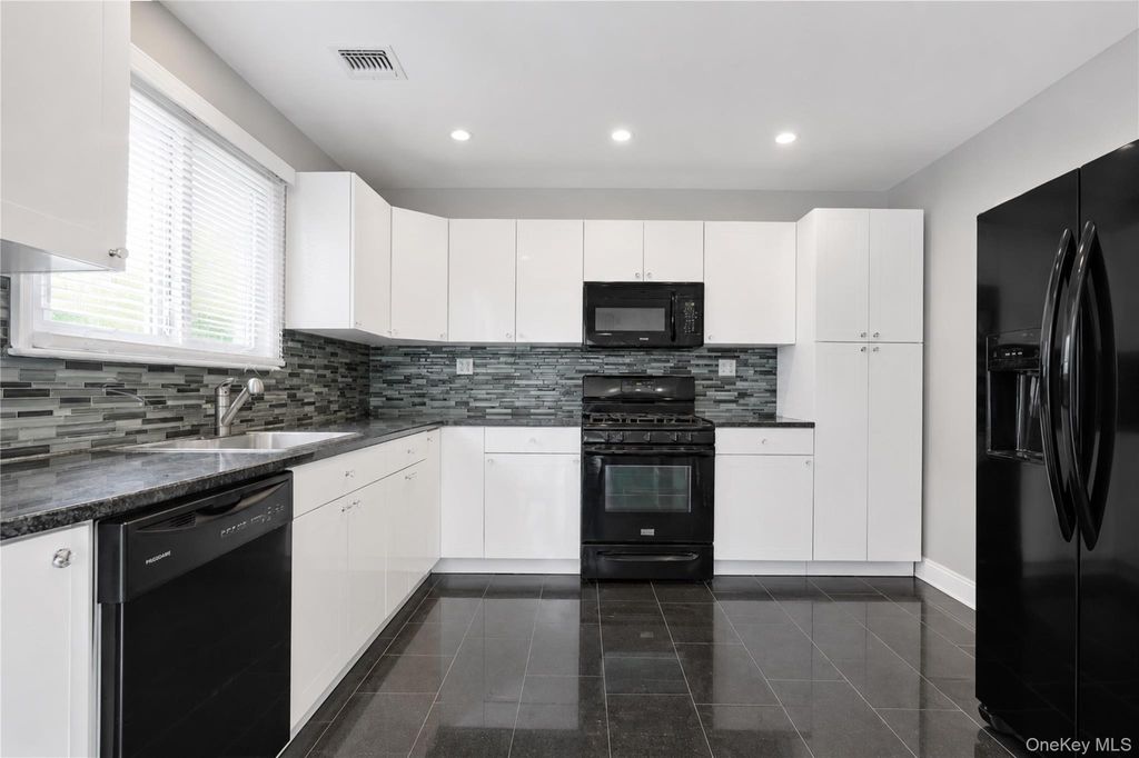 Photo of 159-28 88th Street, Howard Beach, NY 11414 (MLS # 1002667)
