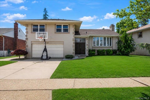 Photo of 648 Diane Place, North Woodmere, NY 11581 (MLS # 1061457)