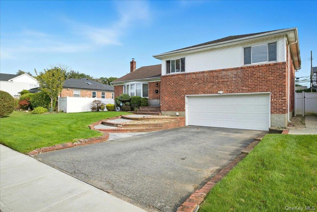 Photo of 1982 Stratford Drive, Westbury, NY 11590 (MLS # 922170)