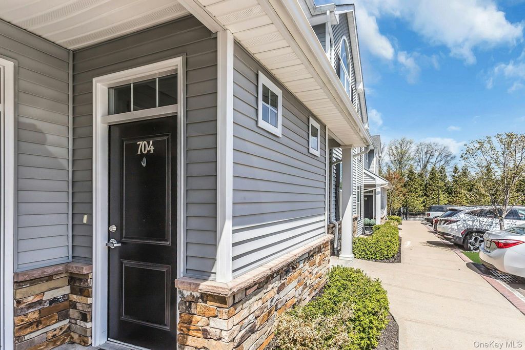 Photo of 704 Breton Way #704, Glen Cove, NY 11542 (MLS # 985041)