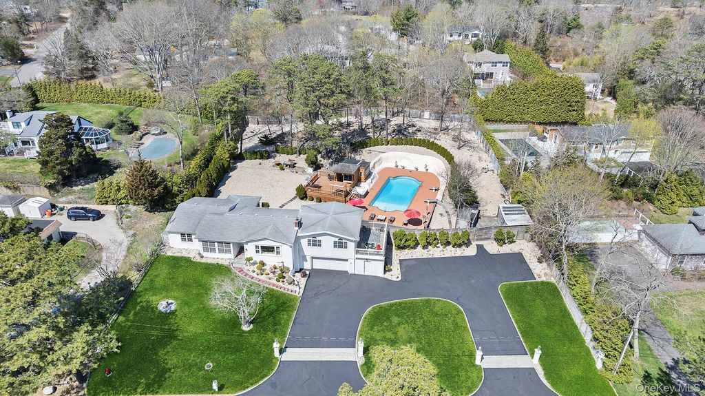 Photo of 5 Huckleberry Lane, East Ln, Hampton Bays, NY 11946 (MLS # 988139)