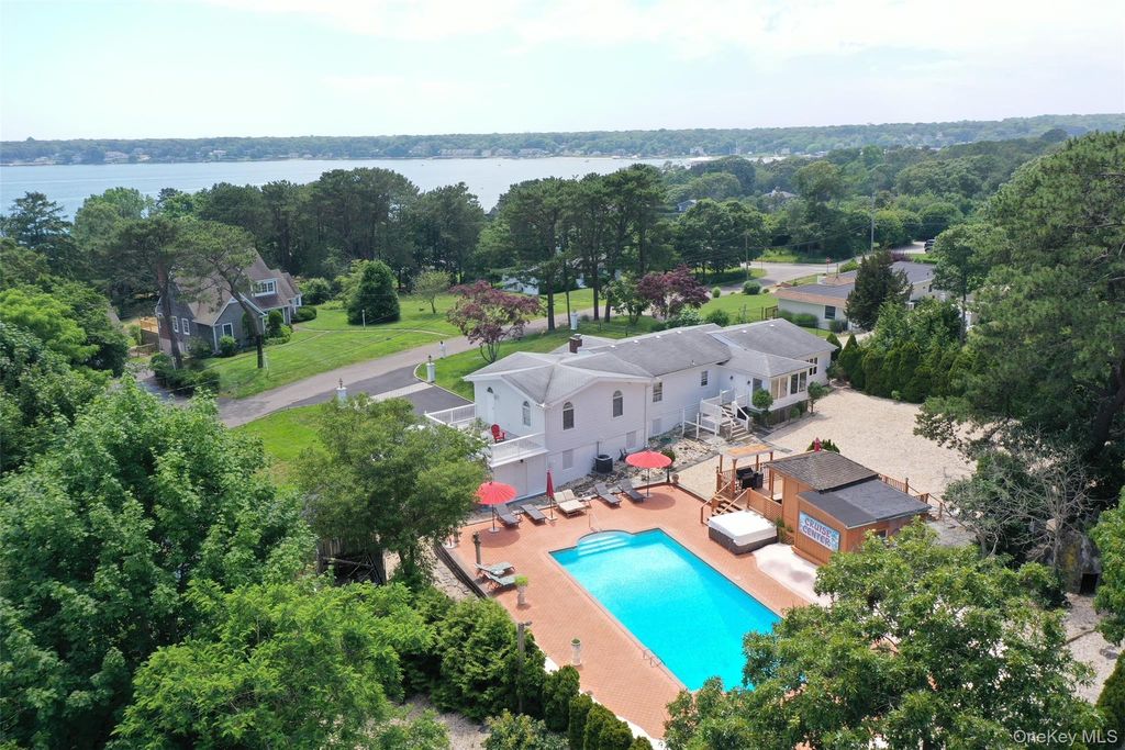 Photo of 5 Huckleberry Lane, East Ln, Hampton Bays, NY 11946 (MLS # 988139)