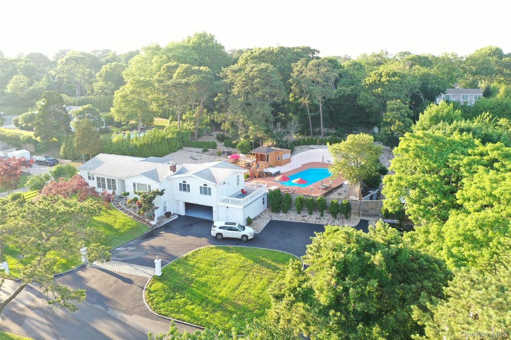 Photo of 5 Huckleberry Lane, East Ln, Hampton Bays, NY 11946 (MLS # 988139)