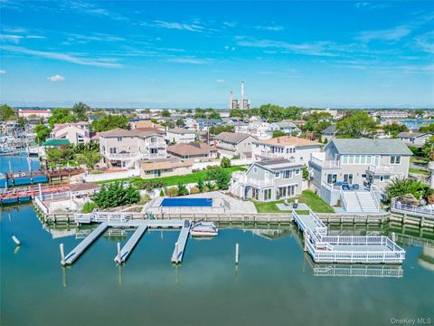 Photo of 210 Saratoga Boulevard, Island Park, NY 11558 (MLS # 917376)