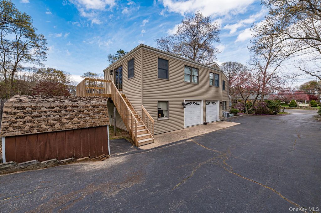 Photo of 114 Randall Road, Shoreham, NY 11786 (MLS # 989153)