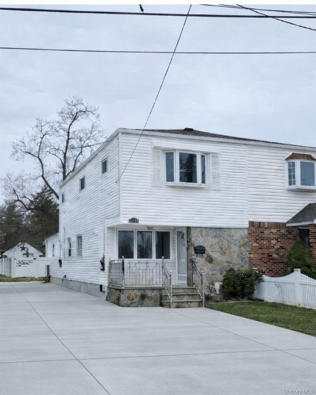 Photo of 6404 136th Street, Flushing, NY 11367 (MLS # 963504)