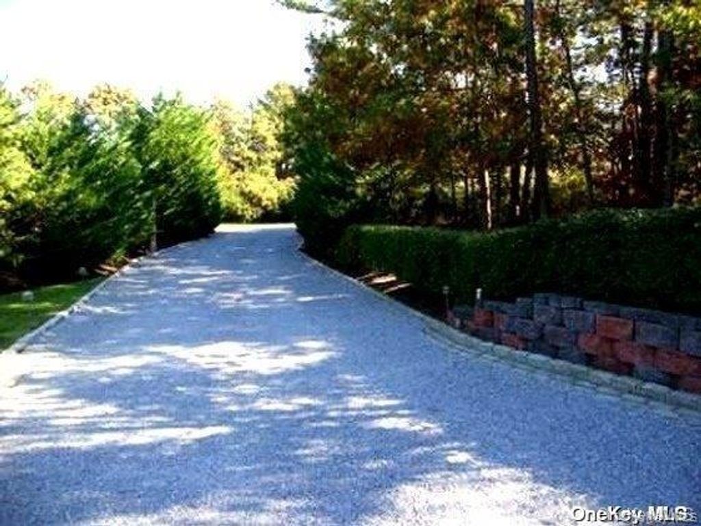 Photo of 9 Kate Court, East Quogue, NY 11942 (MLS # 997259)